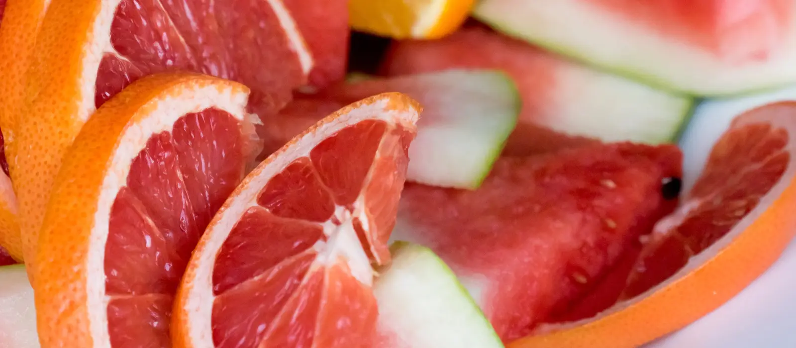Sliced watermelon, grapefruit and orange