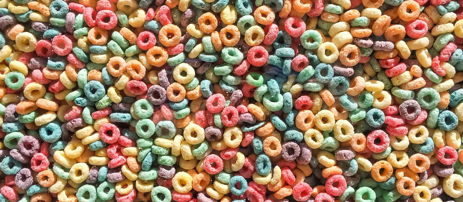 Ring-shaped, fruit flavoured sugary cereal